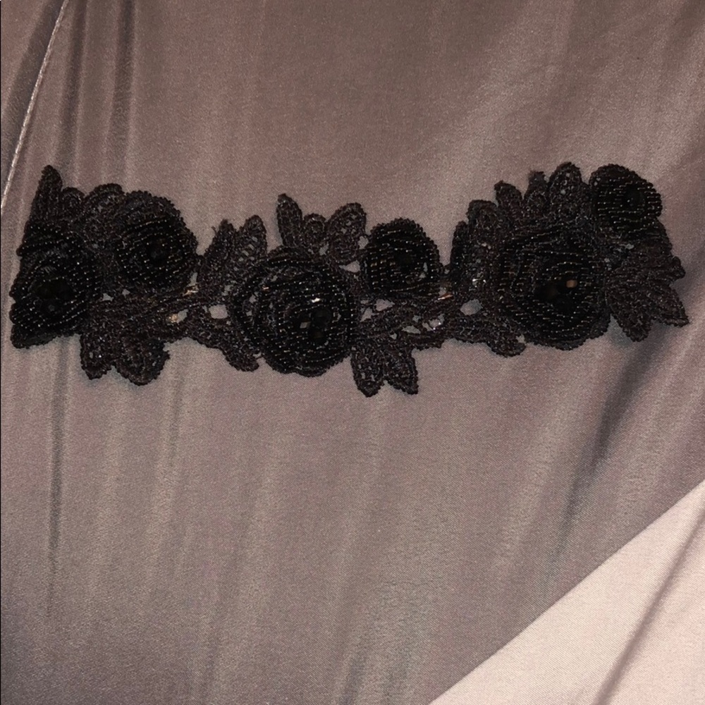 Black embellished choker necklace.